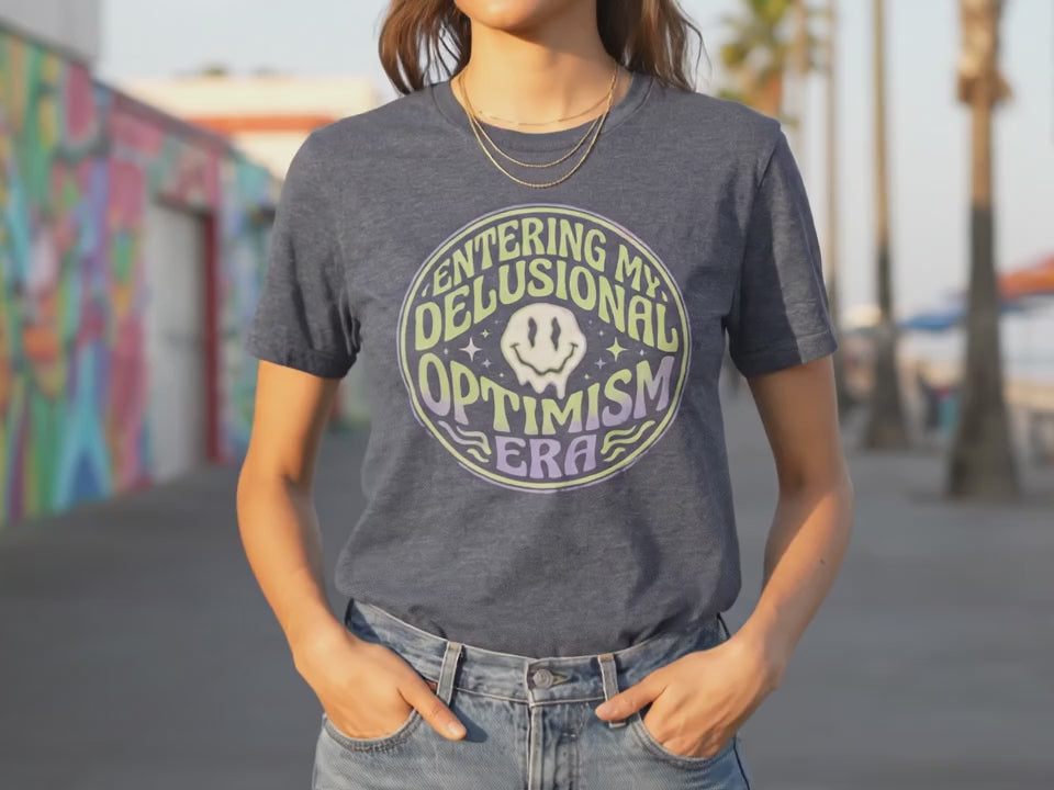 Delusional Optimism Era T-Shirt | Ironic Positivity Tee | Main Character Energy Shirt | Funny Manifestation Gift for Gen Z and Millennials - Product Video